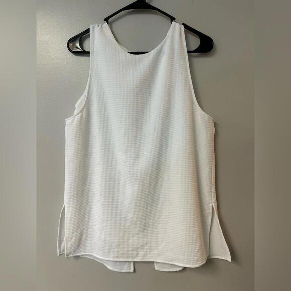 Violet & Claire Tops - Violet and Claire white sleeveless shirt with zipper back and bottom back slit